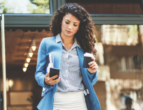 woman walking on phone